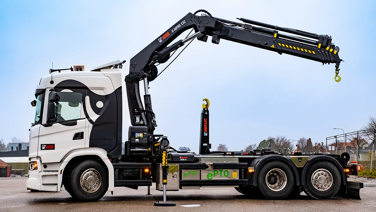 Loader crane hire Barking unloading pallets from a commercial vehicle in IG11